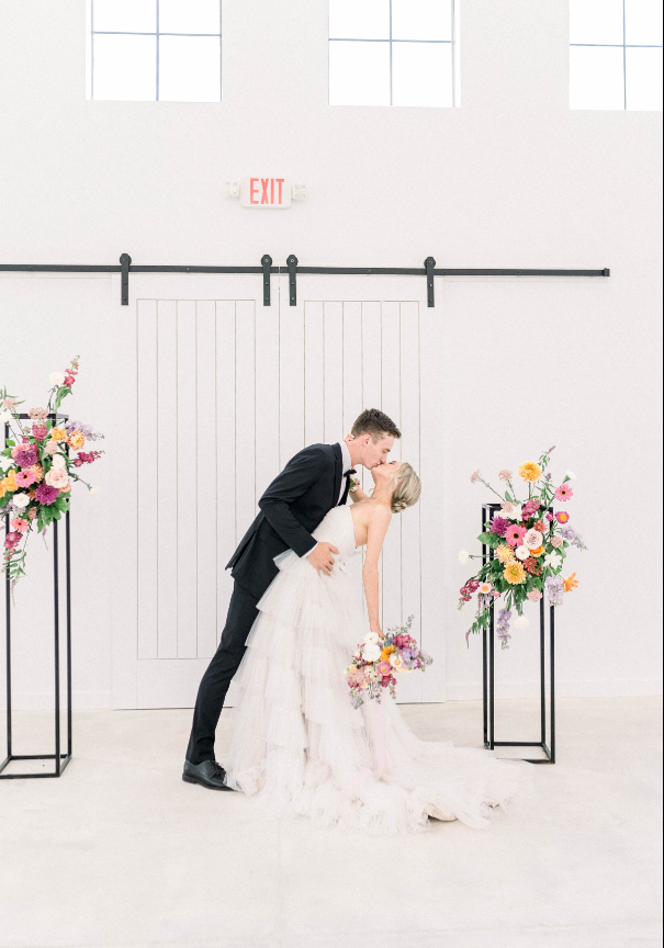 A classic yet modern bride and groom begin their happily ever after at The Monroe on 415th wedding venue in McMinnville, TN located near Nashville. 