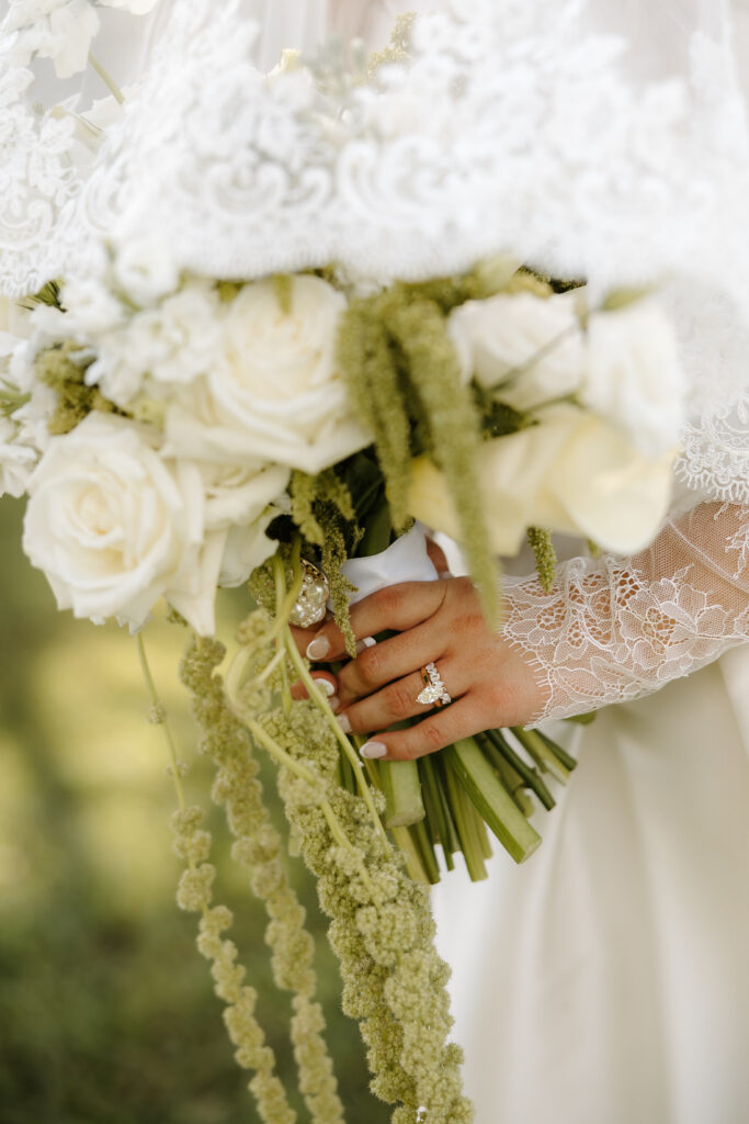 Bridal bouquet and wedding ring and band